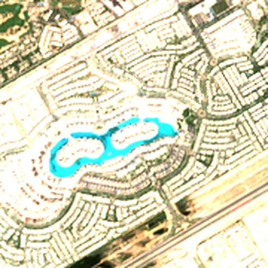 Close-up of the same image: water in the lagoon ring at Tilal Al Ghaf